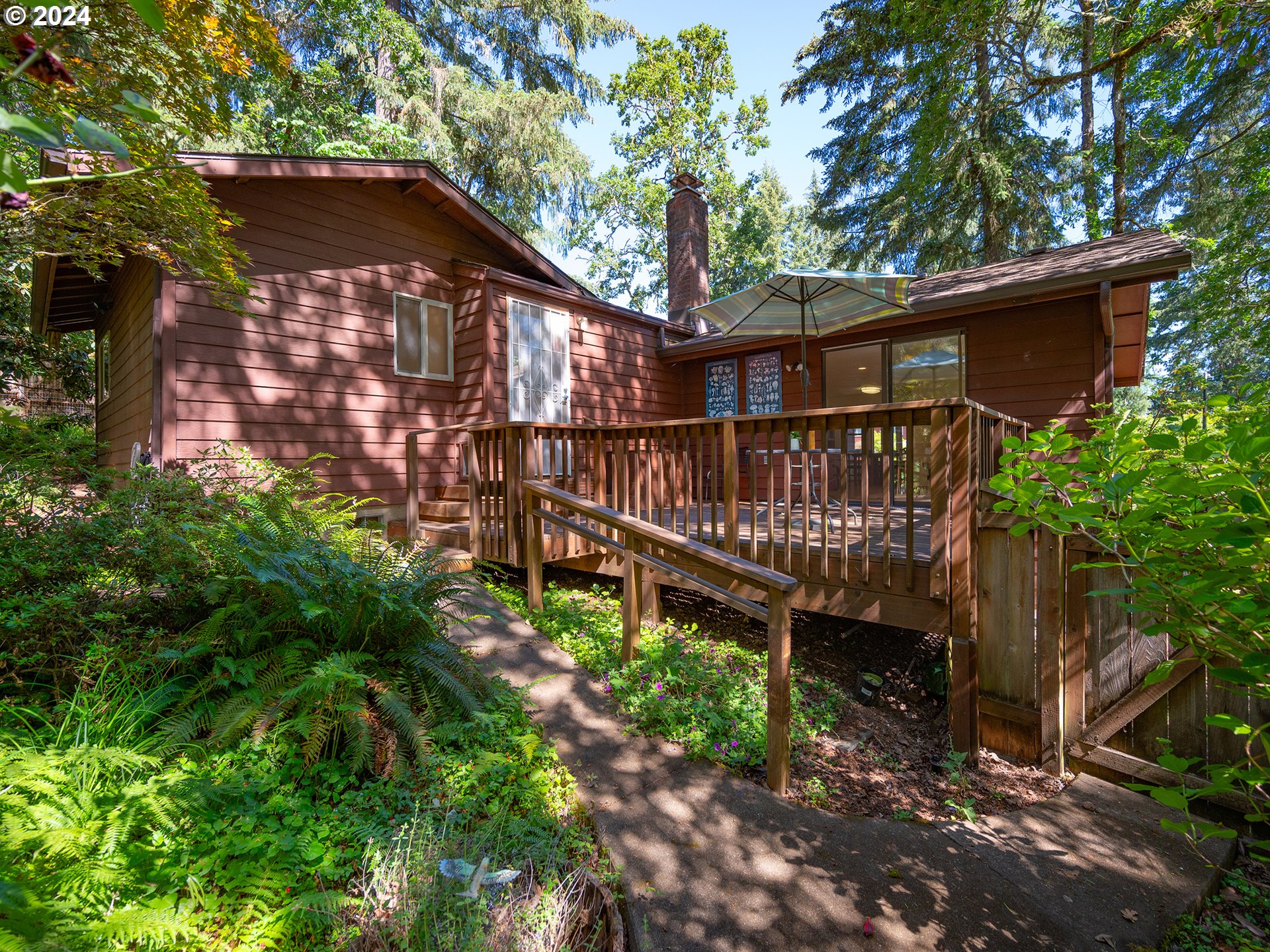 1778 West 27th Place Eugene, OR 97405 - Photo 33 of 43 a view of a house with a yard