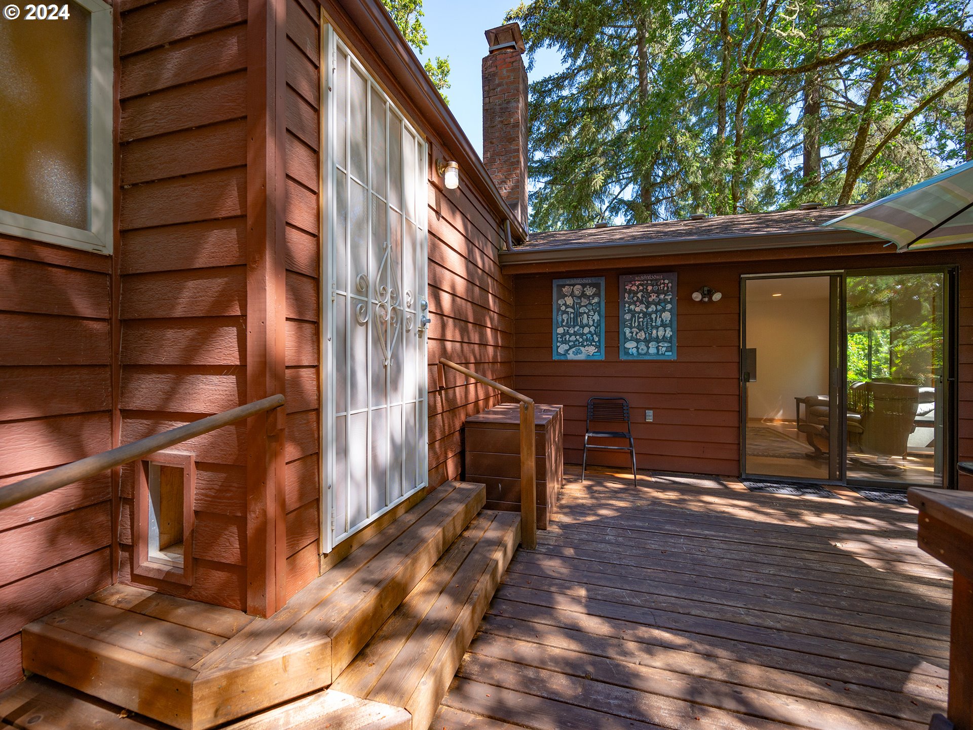 1778 West 27th Place Eugene, OR 97405 - Photo 43 of 43 a view of a house with a door and wooden walls