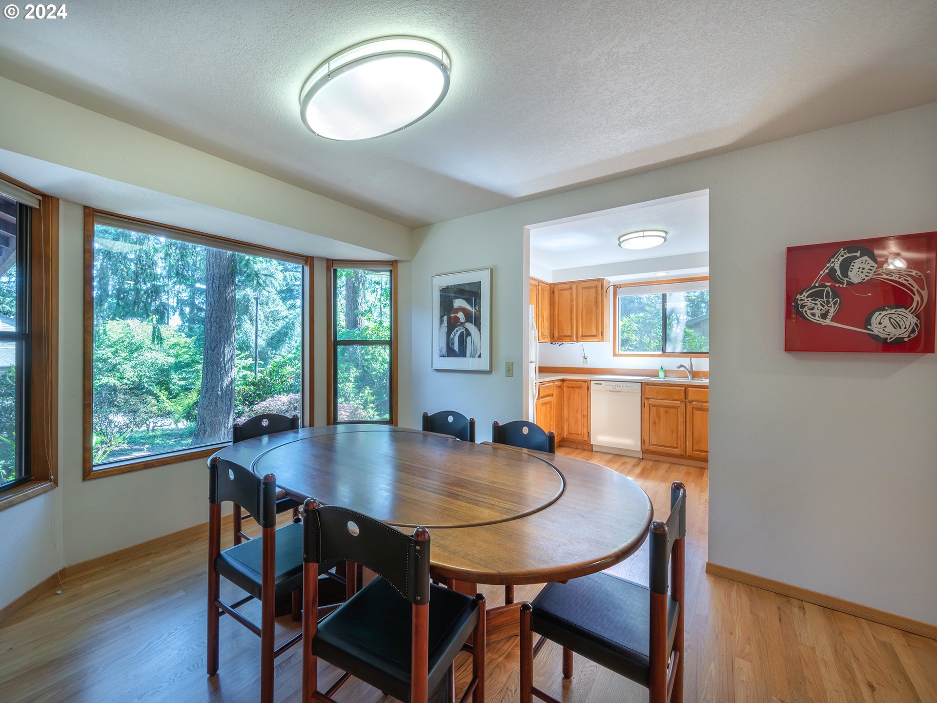 1778 West 27th Place Eugene, OR 97405 - Photo 7 of 43 a view of a dining room with furniture window and wooden floor