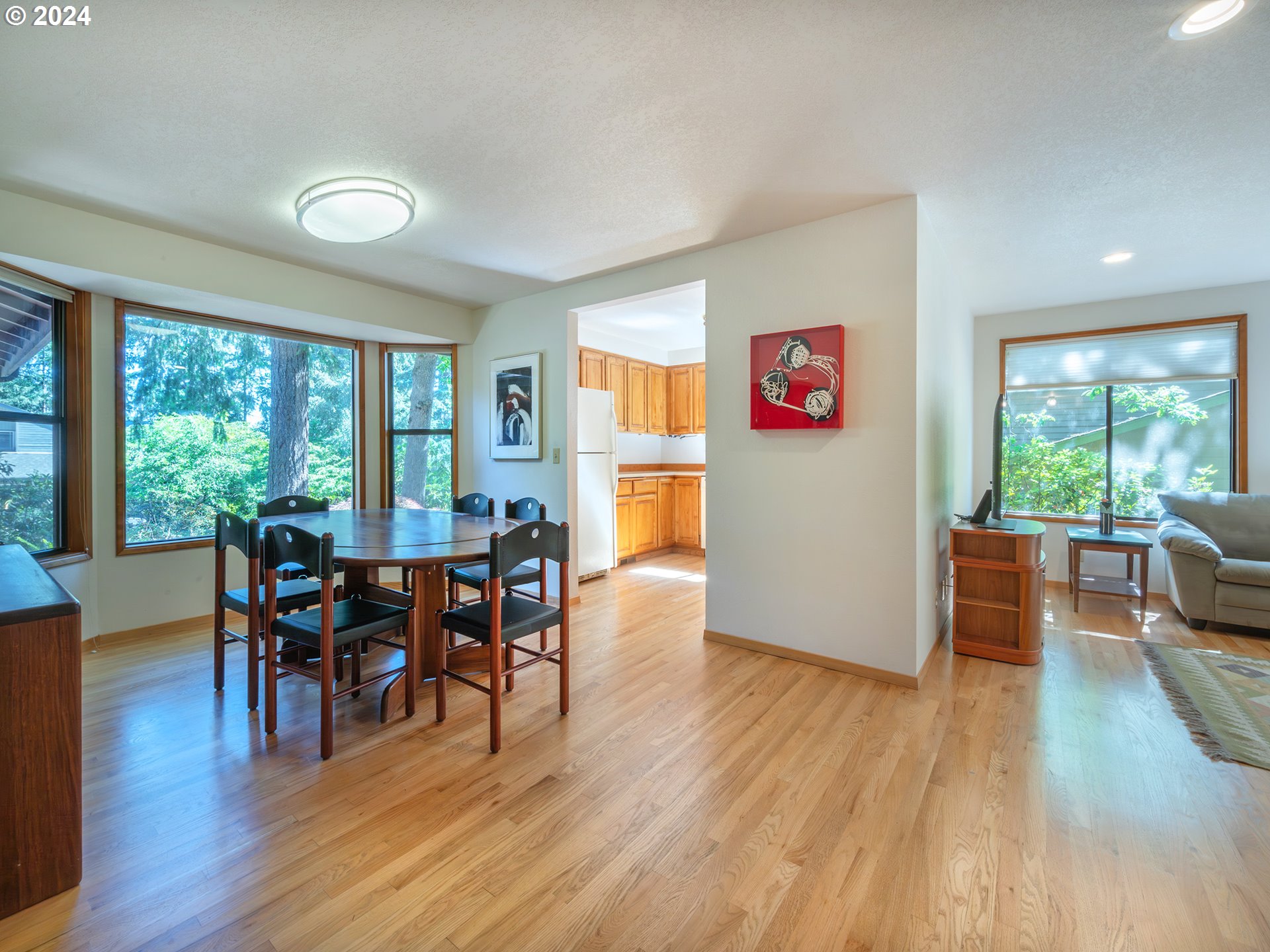 1778 West 27th Place Eugene, OR 97405 - Photo 8 of 43 a view of a dining room with furniture window and wooden floor
