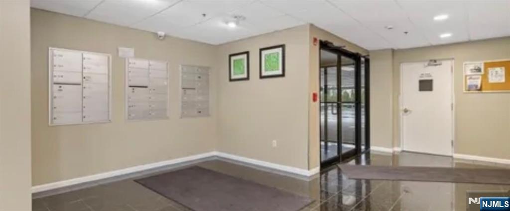 39 Union Street, Unit 301 Hackensack, NJ 07601 - Photo 2 of 14 a view of hallway with livingroom