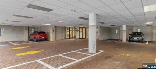 a kitchen with a stove top oven sink and cabinets