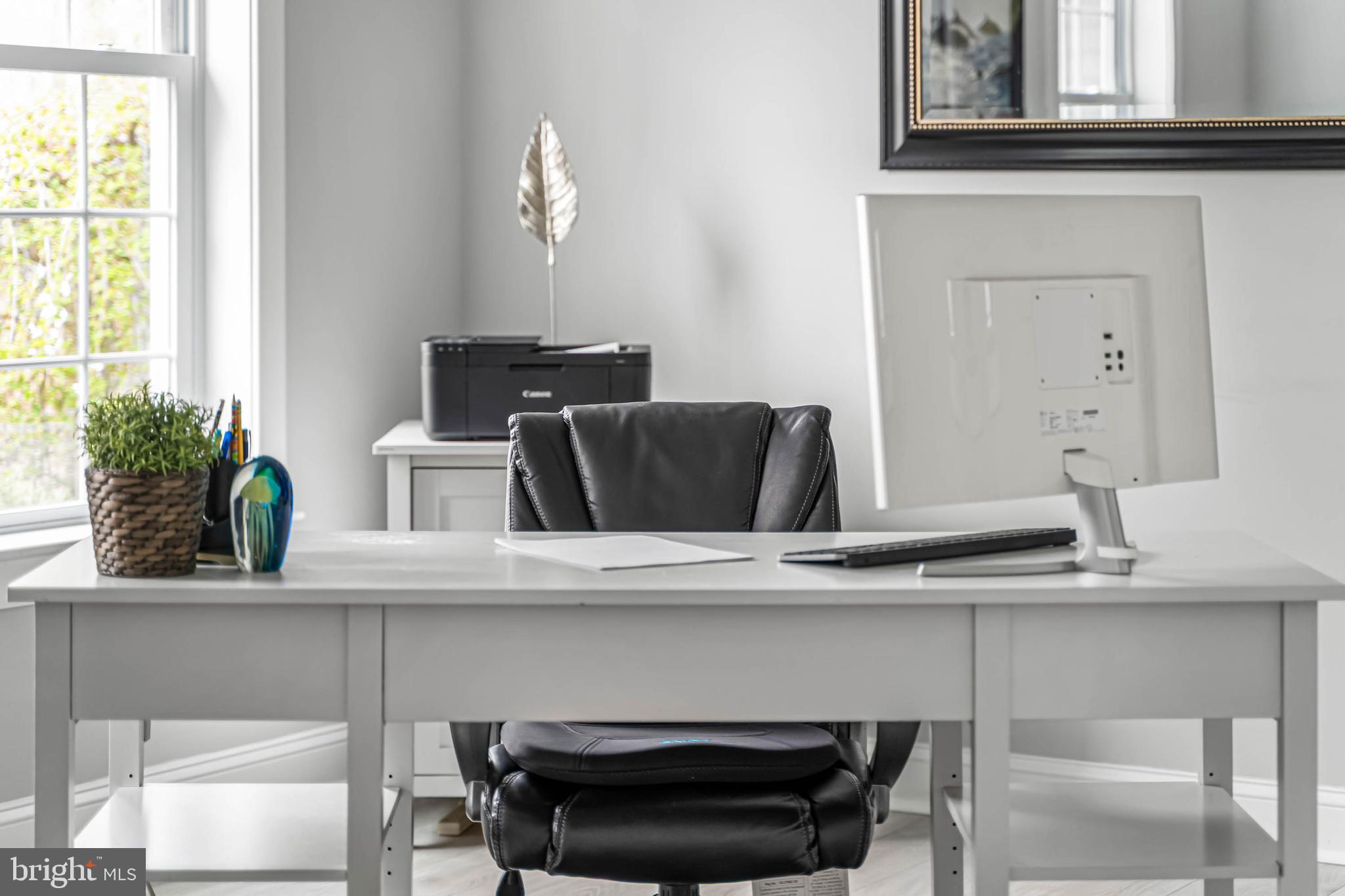 33096 Burbage Road Frankford, DE 19945 - Photo 19 of 53 a kitchen with a table and a potted plant