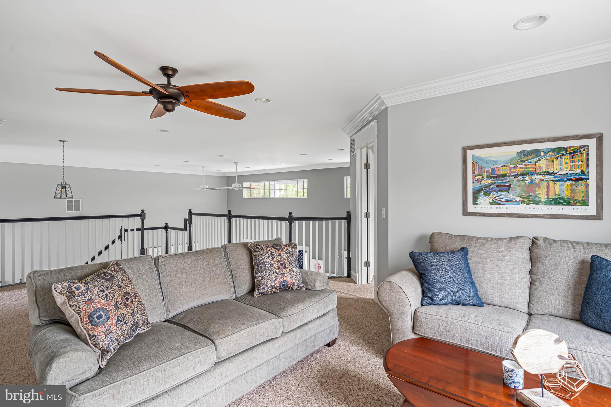 33096 Burbage Road Frankford, DE 19945 - Photo 22 of 53 a living room with furniture and a ceiling fan