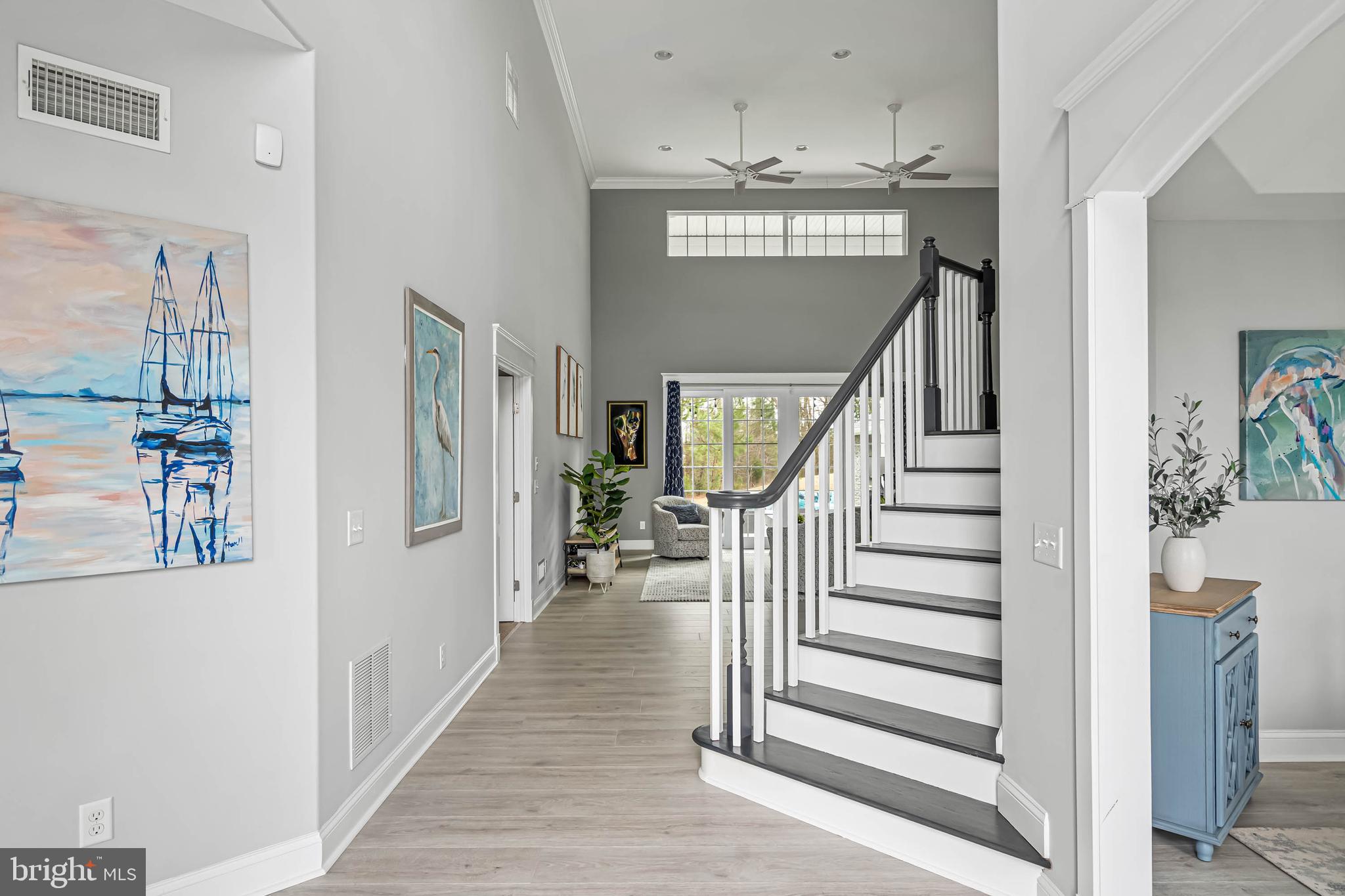33096 Burbage Road Frankford, DE 19945 - Photo 3 of 53 a view of entryway and hall with wooden floor