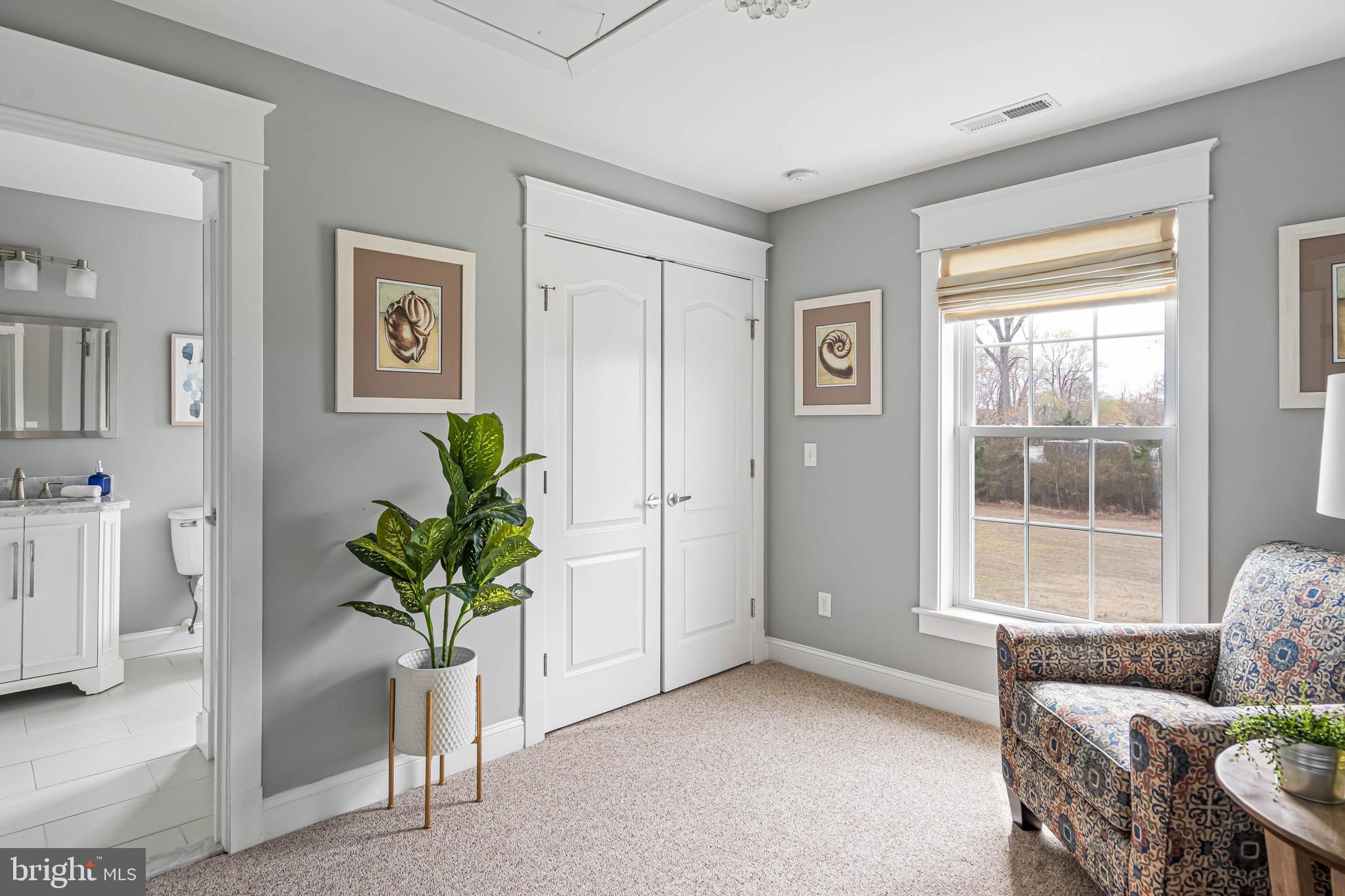 33096 Burbage Road Frankford, DE 19945 - Photo 35 of 53 a view of living room filled with furniture and a potted plant