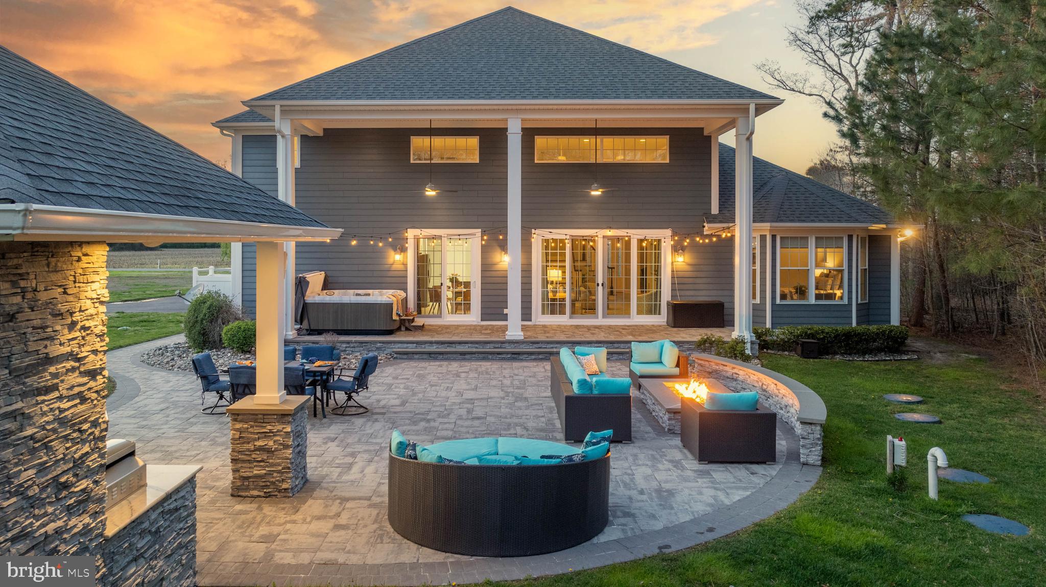 33096 Burbage Road Frankford, DE 19945 - Photo 40 of 53 a front view of a house with garden and patio