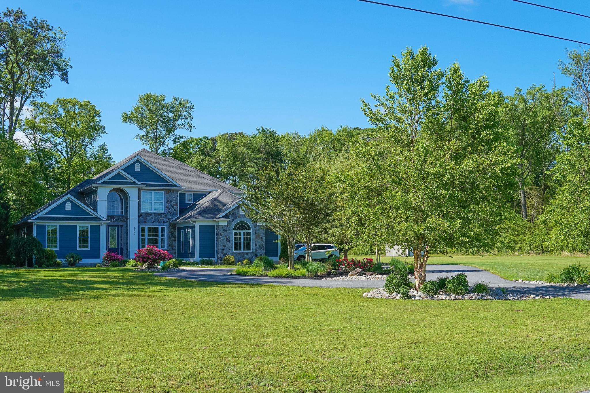 33096 Burbage Road Frankford, DE 19945 - Photo 49 of 53 a front view of a house with garden