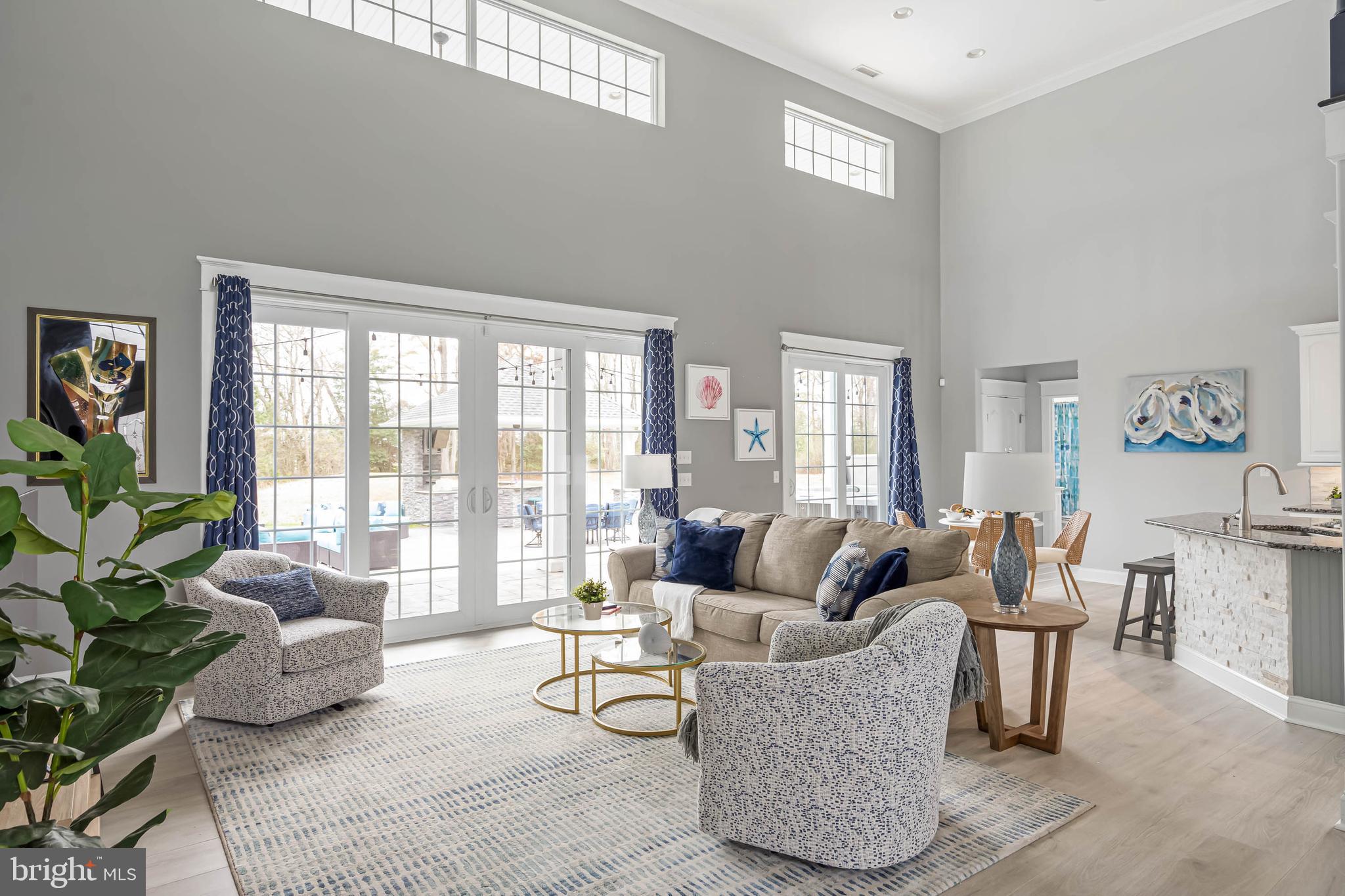 33096 Burbage Road Frankford, DE 19945 - Photo 5 of 53 a living room with furniture and a large window