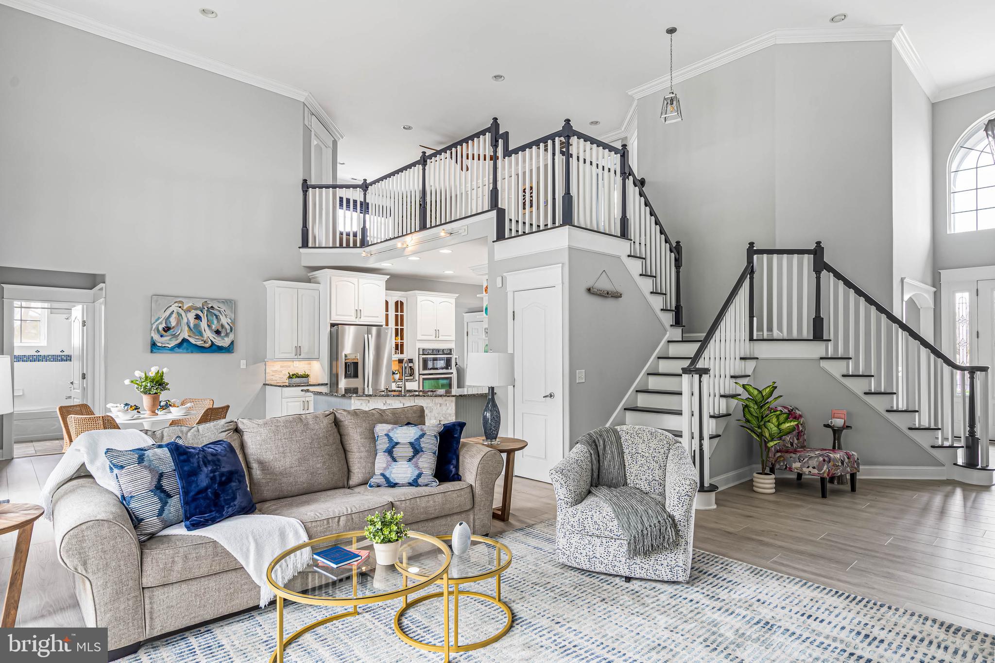 33096 Burbage Road Frankford, DE 19945 - Photo 6 of 53 a living room with furniture and wooden floor