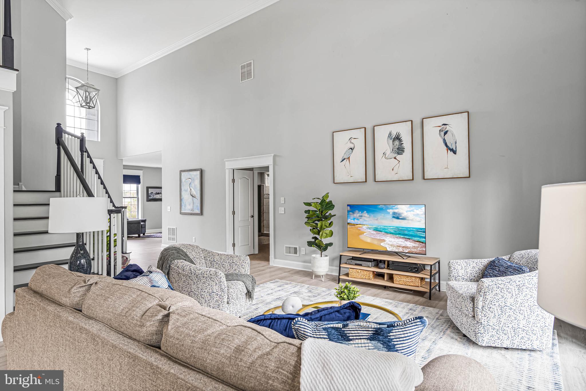 33096 Burbage Road Frankford, DE 19945 - Photo 7 of 53 a living room with furniture and wooden floor