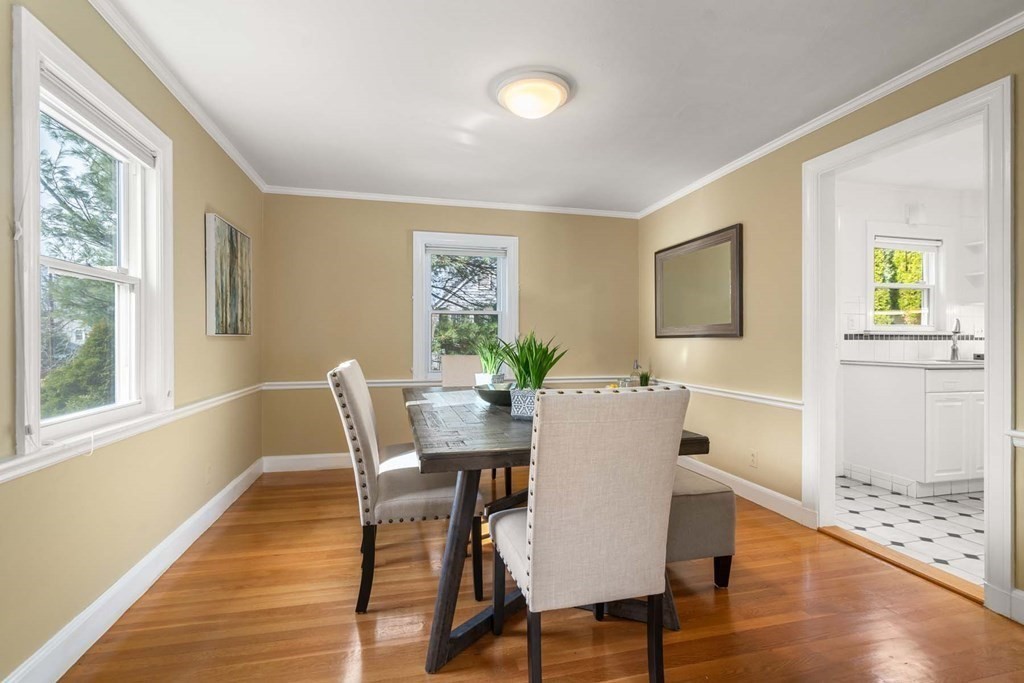25 Puritan Road Newton, MA 02461 - Photo 5 of 34 a view of a dining room with furniture window and wooden floor