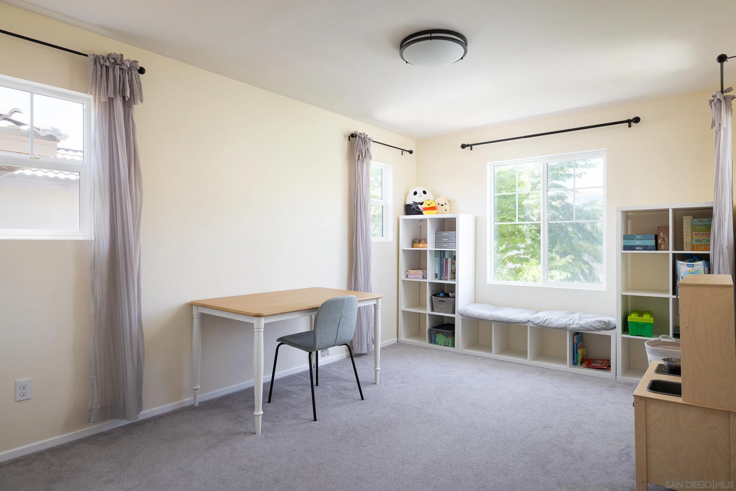 211 Spotted Saddle Way Fallbrook, CA 92028 - Photo 16 of 24 a workspace with furniture and a window