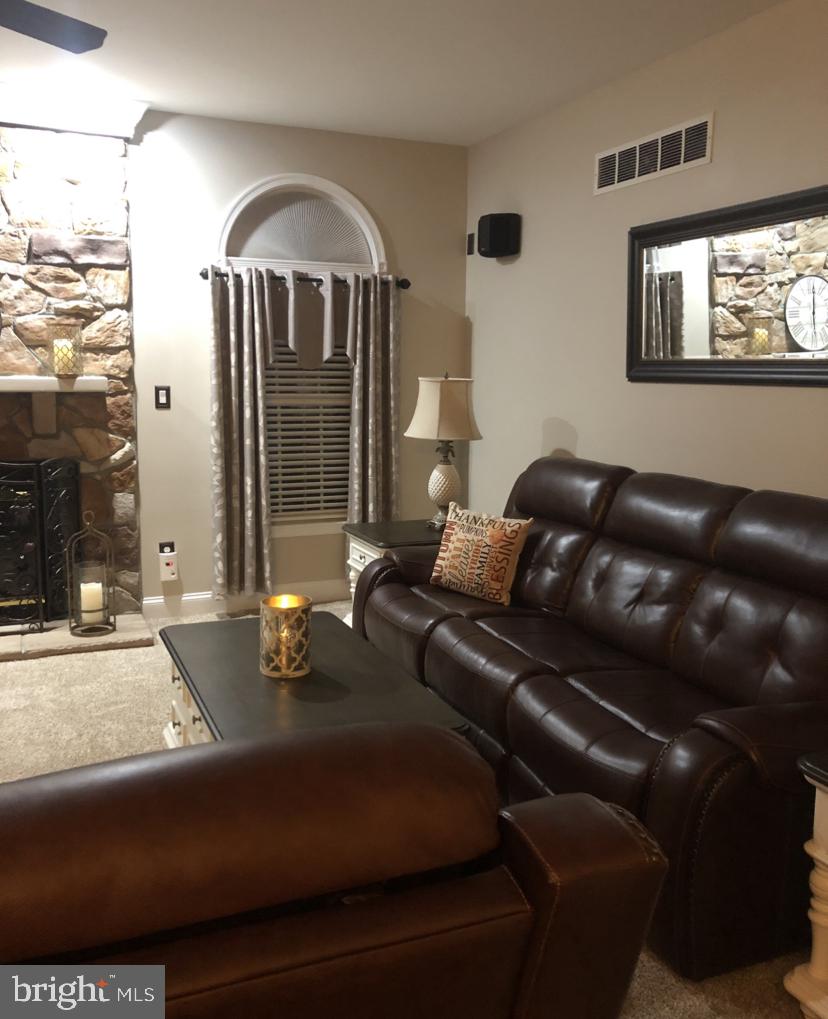6610 Aaron Mee Way Rosedale, MD 21237 - Photo 5 of 37 Family Room with Stone Fireplace