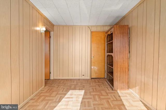 a view of a bathroom with shower and a window