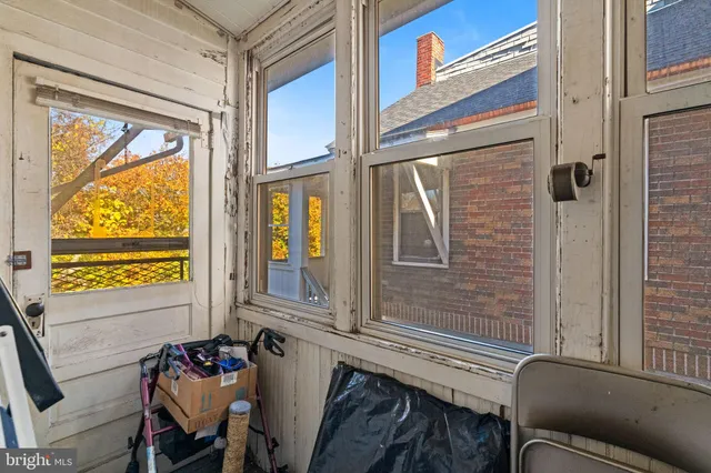 a view of a living room and dining room