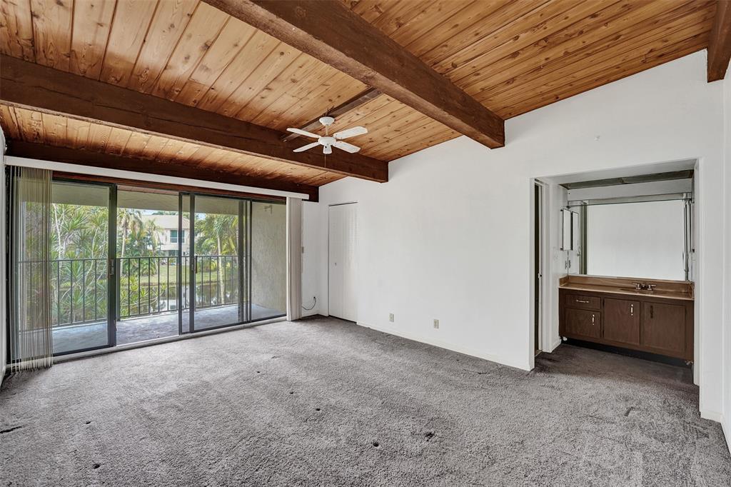 750 East Coco Plum Circle, Unit 2 Plantation, FL 33324 - Photo 13 of 21 a view of an empty room with a window