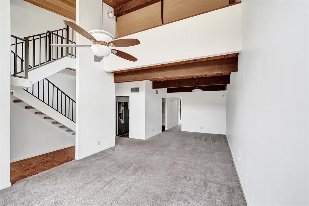 750 East Coco Plum Circle, Unit 2 Plantation, FL 33324 - Photo 4 of 21 a view of a hallway with staircase