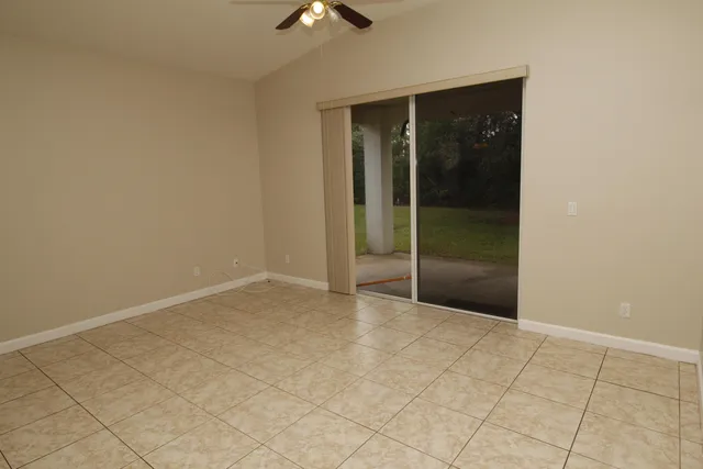 an empty room with fan