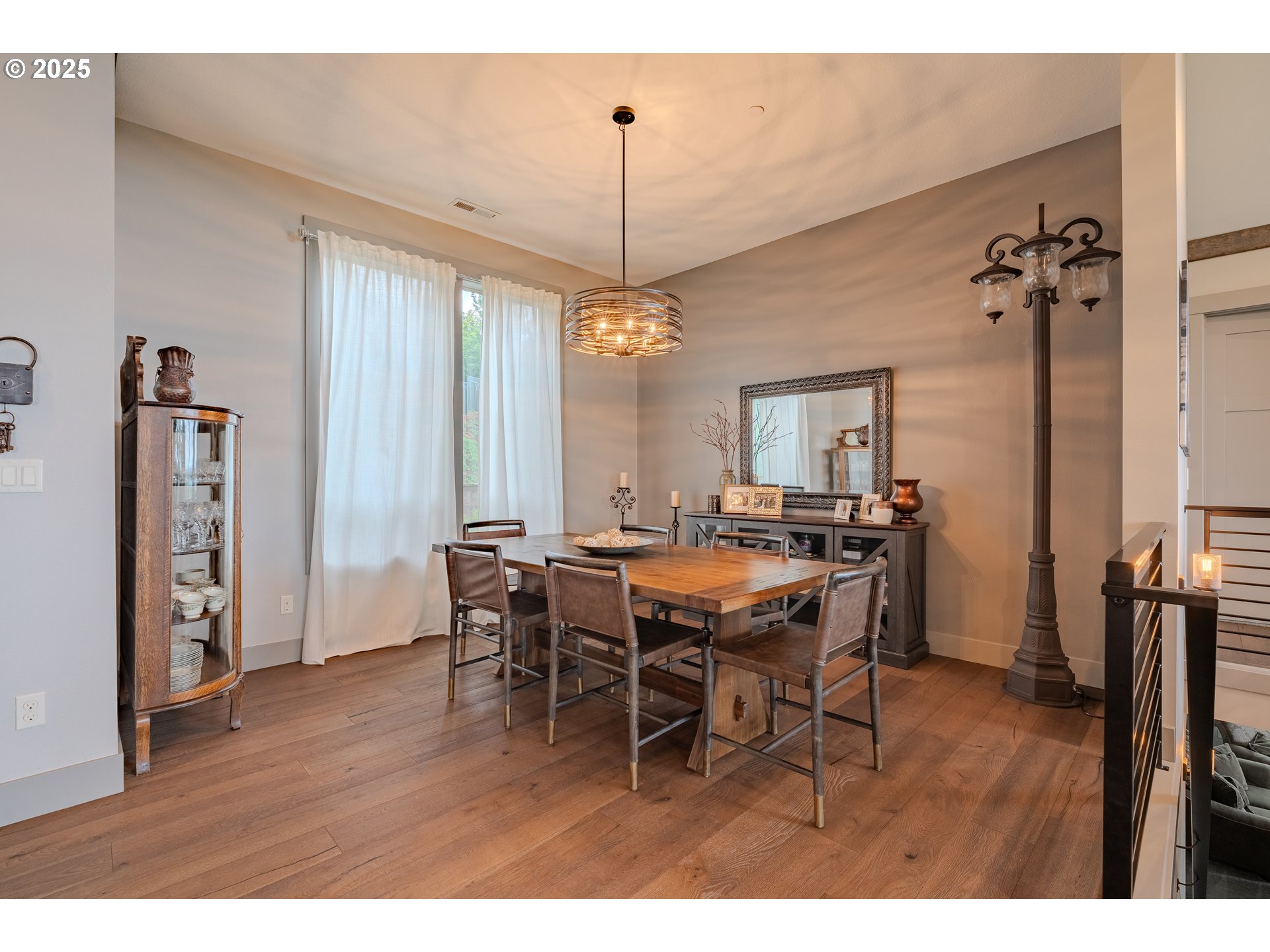 2012 Northwest Sierra Lane Camas, WA 98607 - Photo 14 of 42 a view of a dining room with furniture window and wooden floor