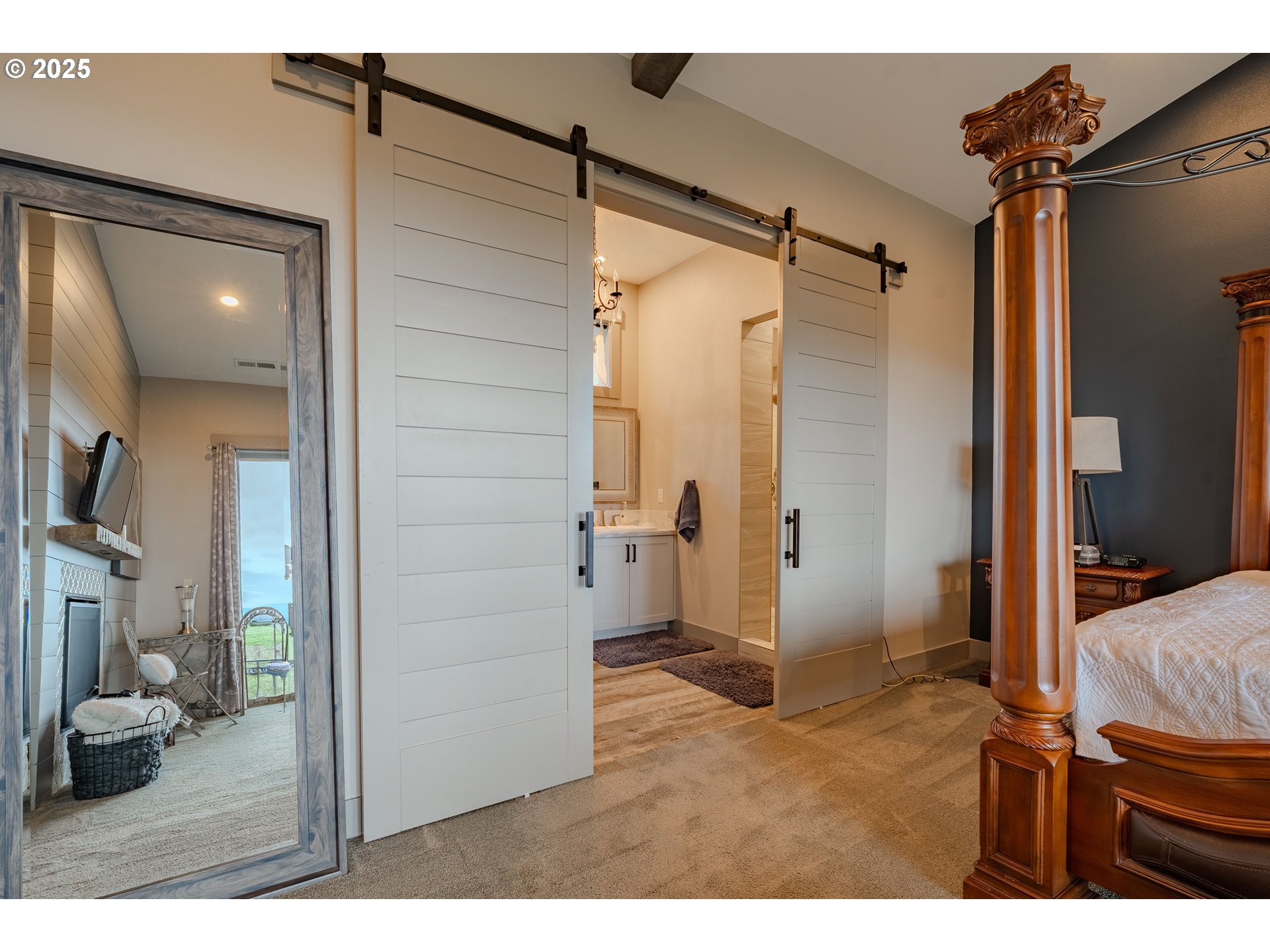 2012 Northwest Sierra Lane Camas, WA 98607 - Photo 18 of 42 a bedroom with a bed and a view of bathroom