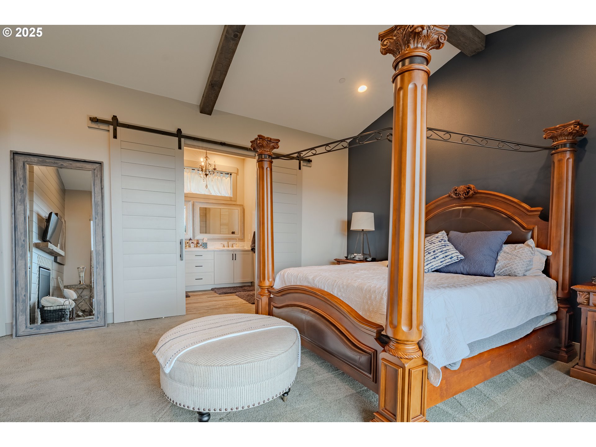 2012 Northwest Sierra Lane Camas, WA 98607 - Photo 19 of 42 a bedroom with a bed and a mirror