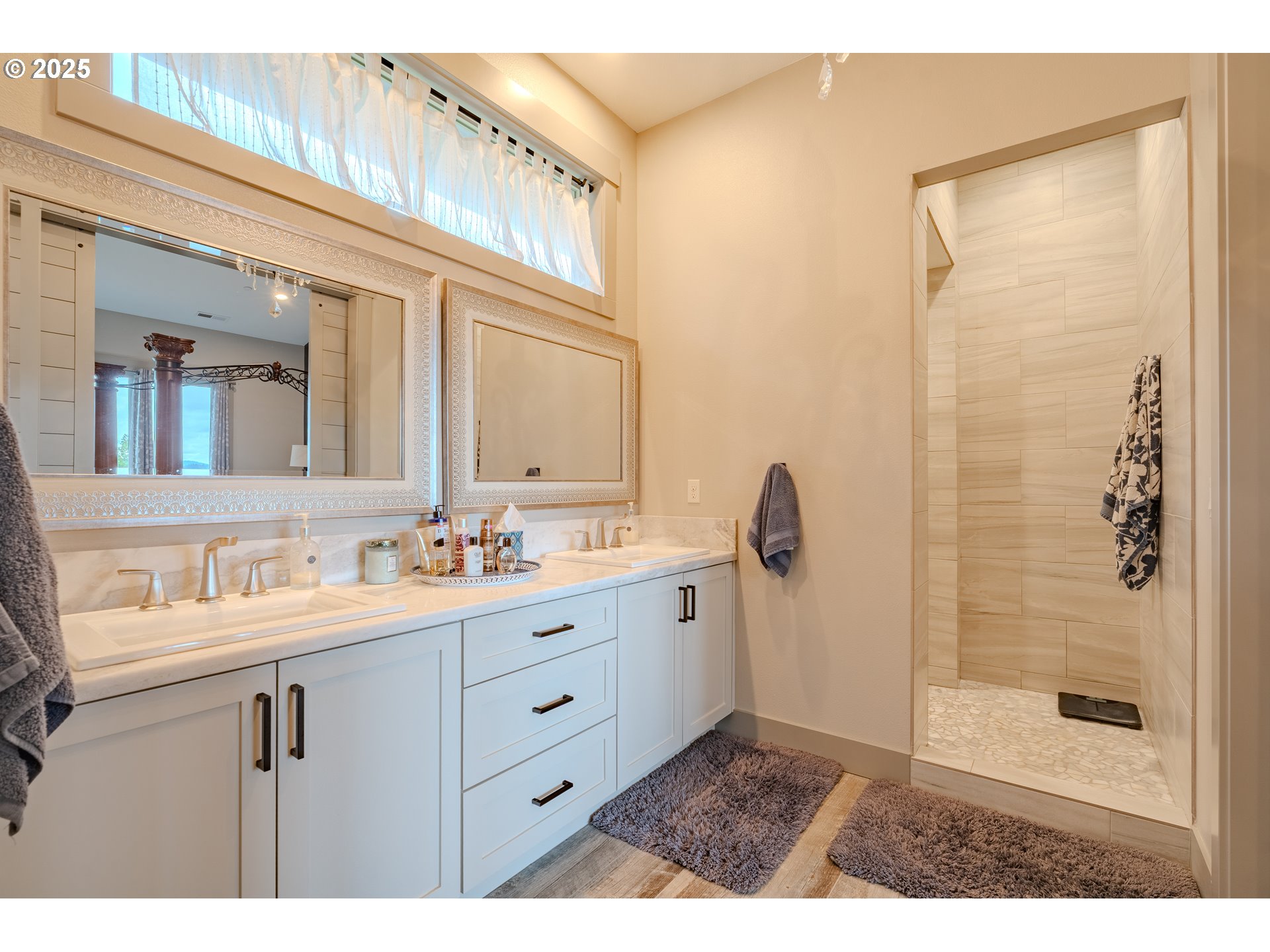 2012 Northwest Sierra Lane Camas, WA 98607 - Photo 22 of 42 a bathroom with a sink a toilet a mirror and shower