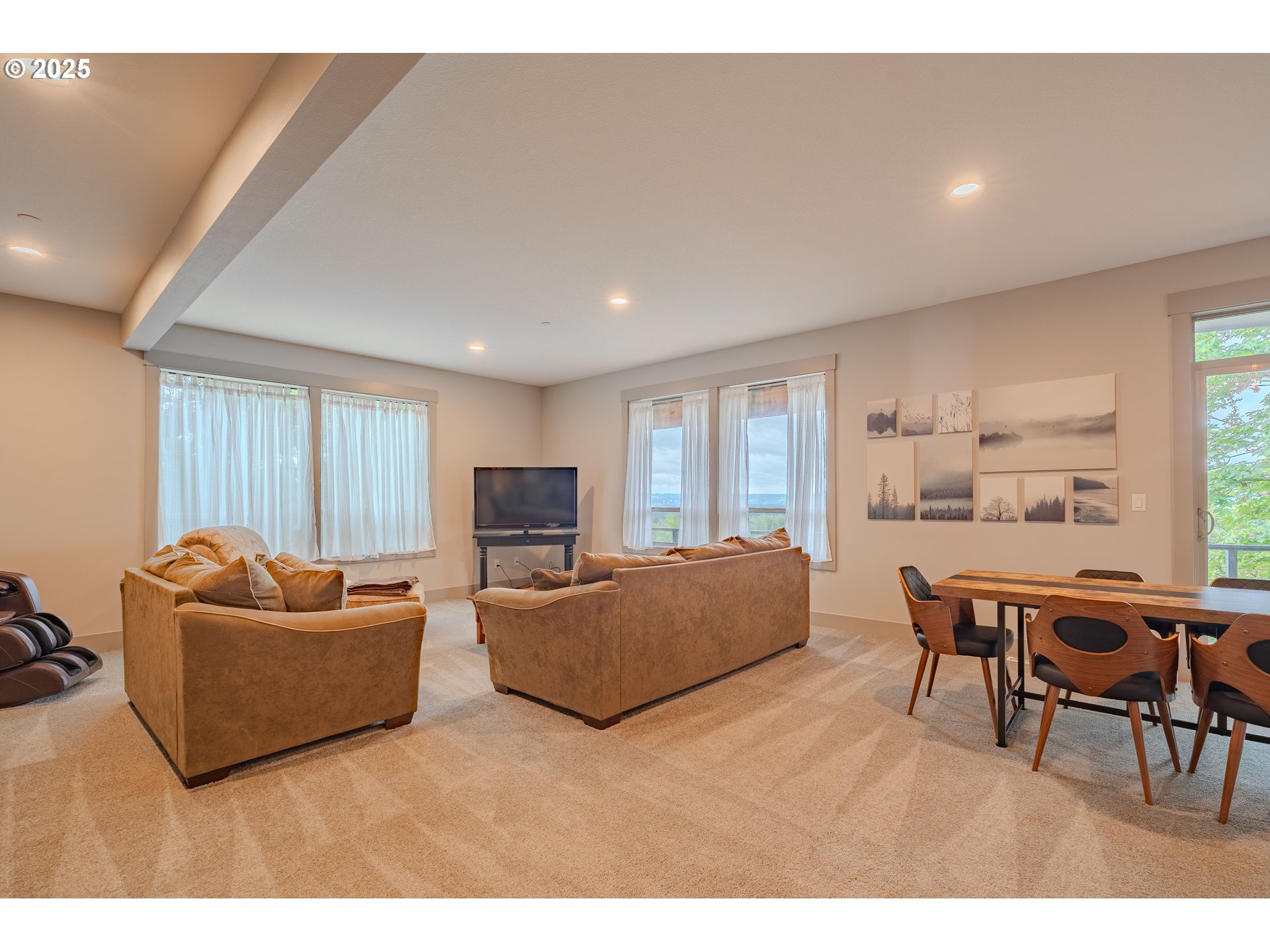 2012 Northwest Sierra Lane Camas, WA 98607 - Photo 27 of 42 a living room with furniture and a flat screen tv