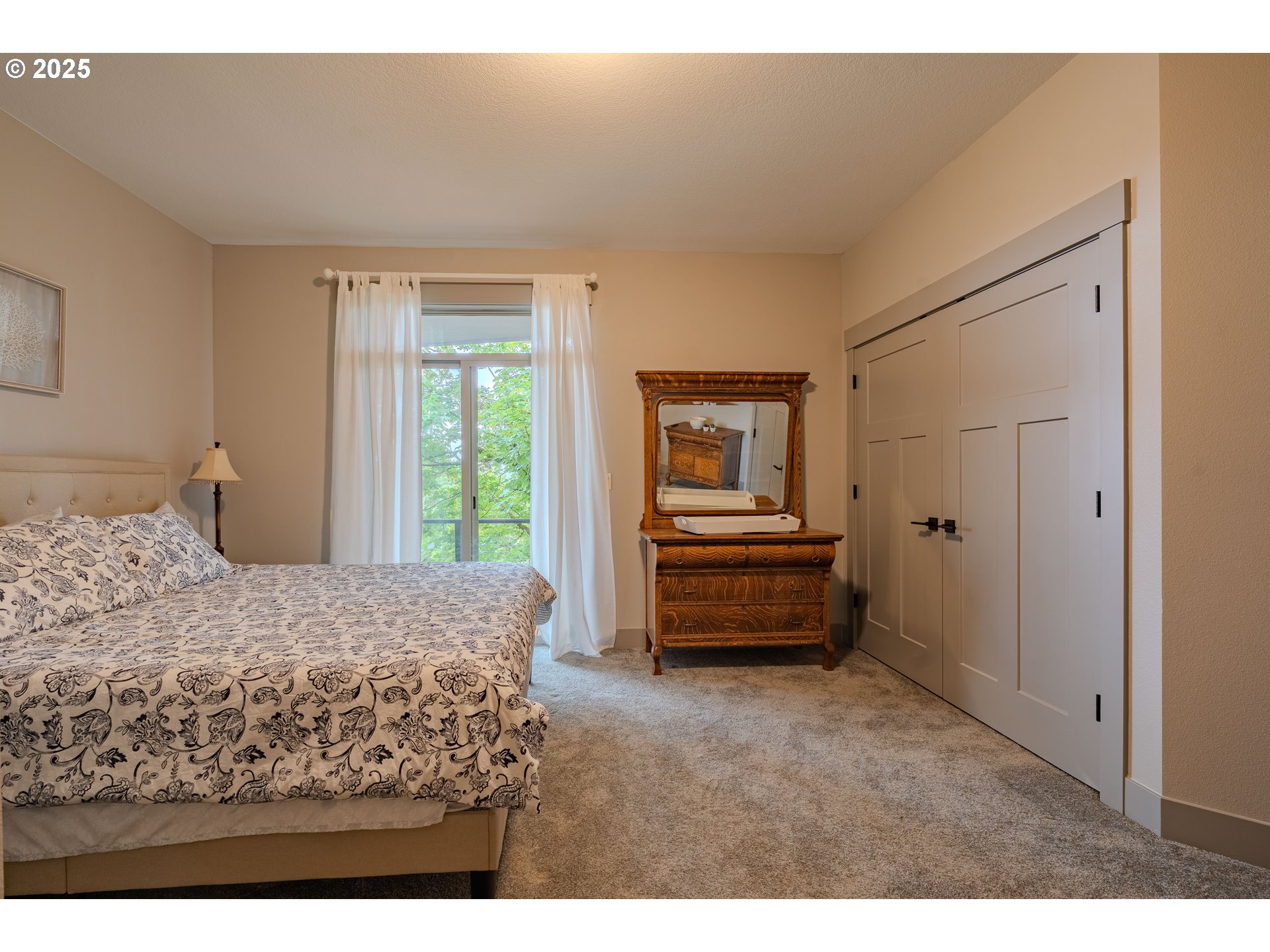 2012 Northwest Sierra Lane Camas, WA 98607 - Photo 28 of 42 a bedroom with a bed and a window