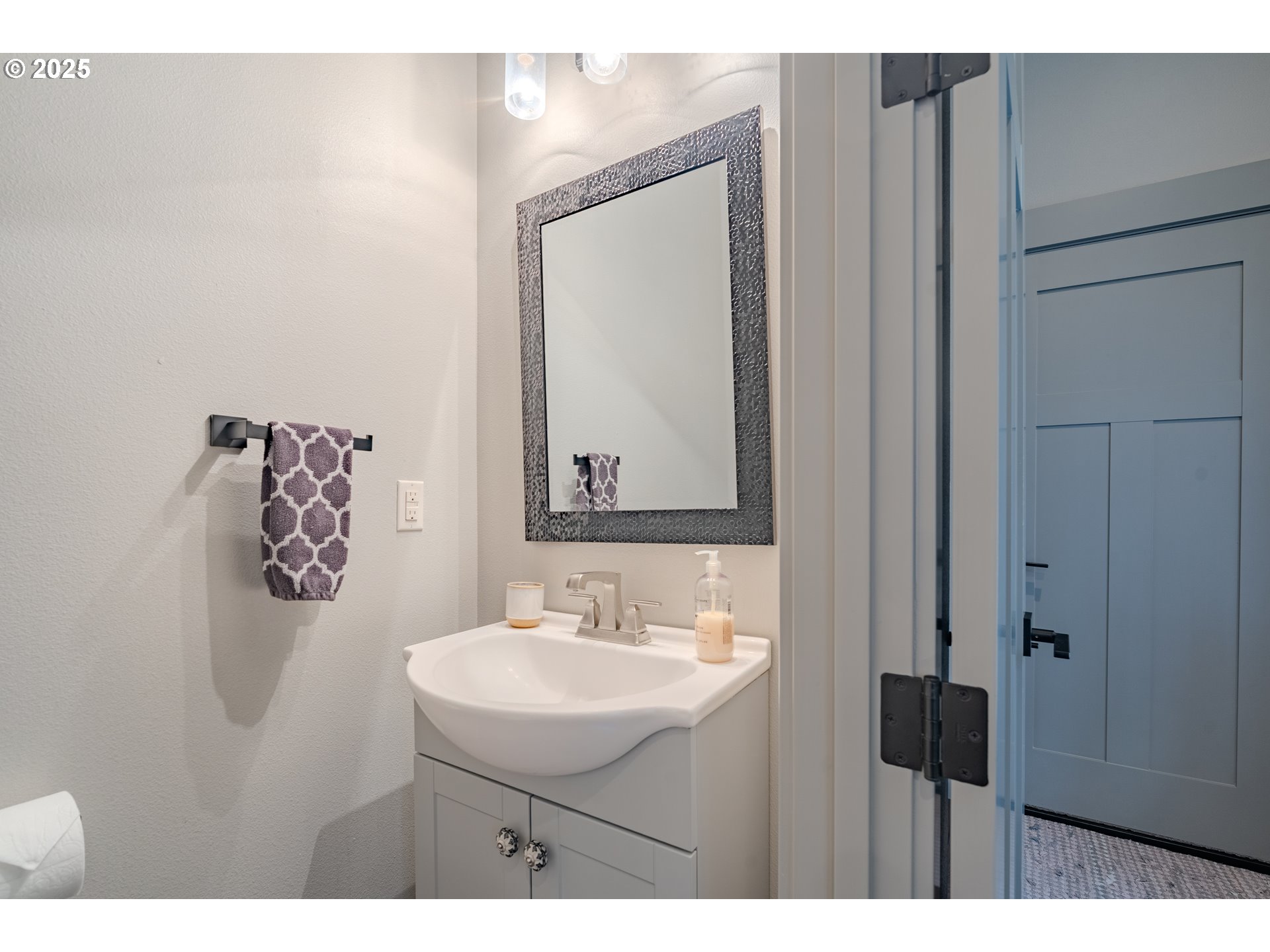 2012 Northwest Sierra Lane Camas, WA 98607 - Photo 31 of 42 a bathroom with a sink and a mirror