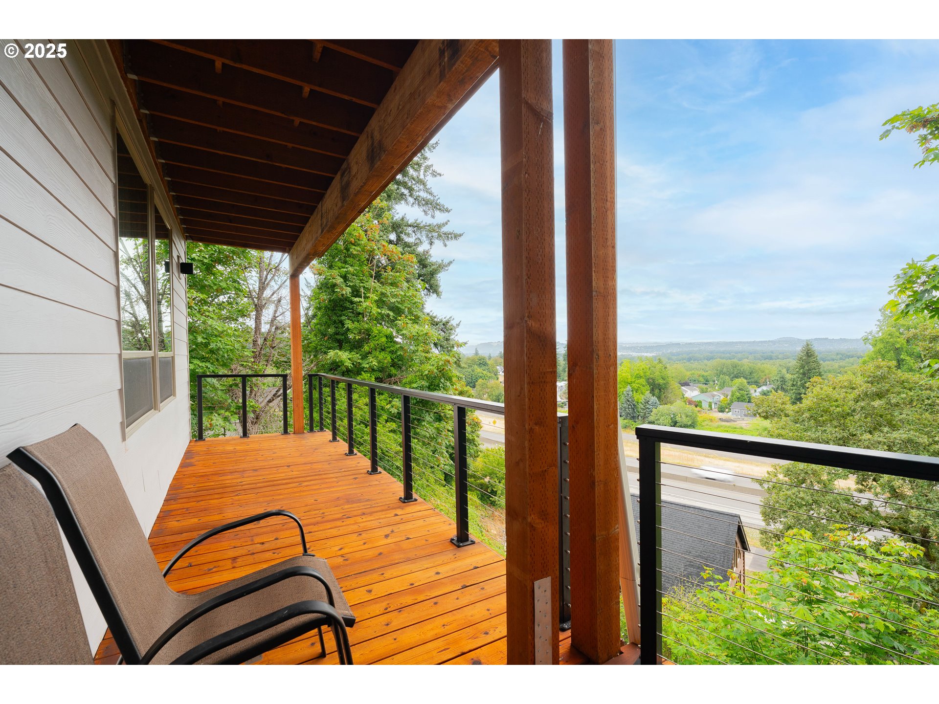 2012 Northwest Sierra Lane Camas, WA 98607 - Photo 33 of 42 a view of a chair and tables in the balcony