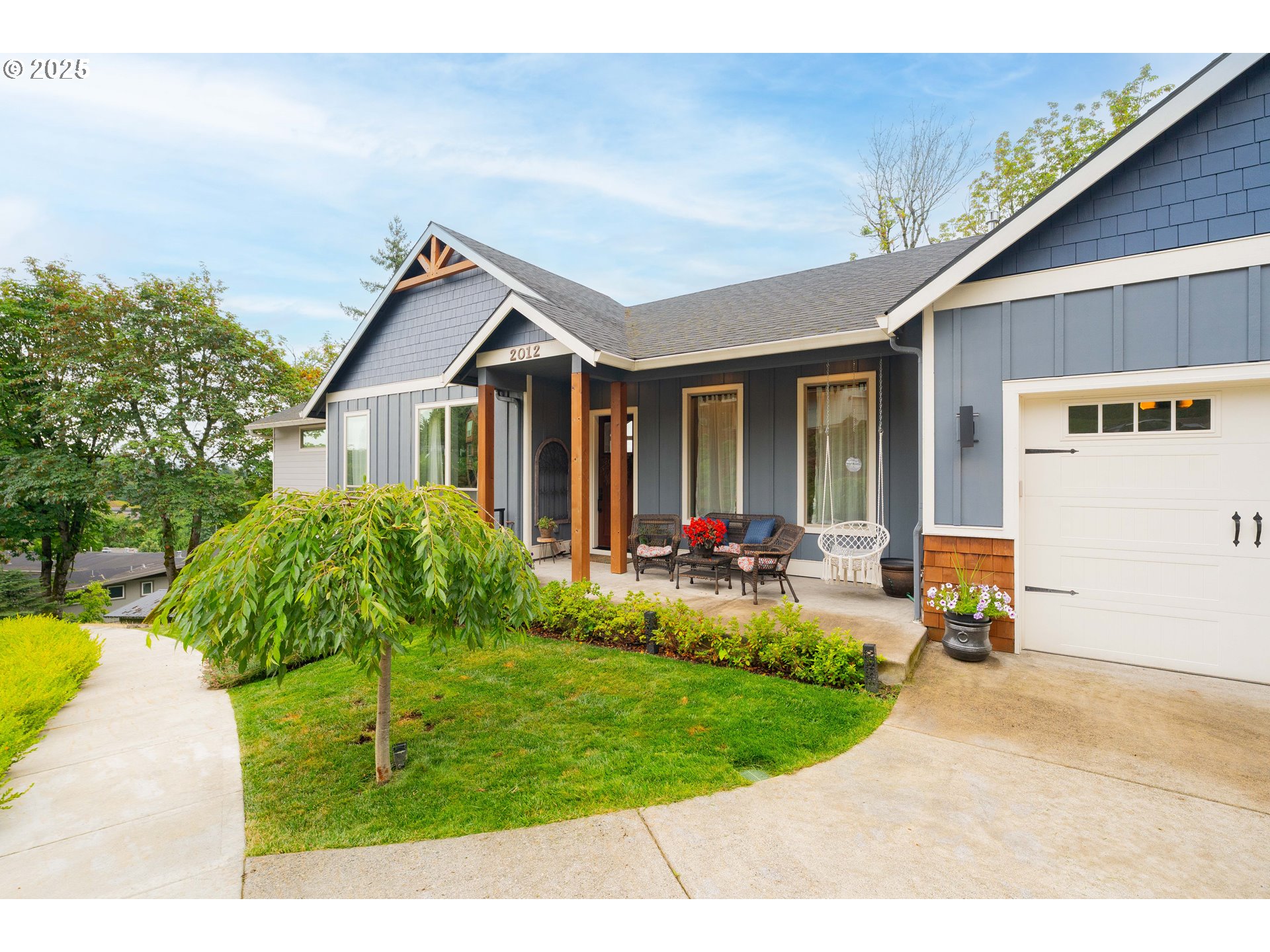 2012 Northwest Sierra Lane Camas, WA 98607 - Photo 42 of 42 a view of a house with backyard and sitting area