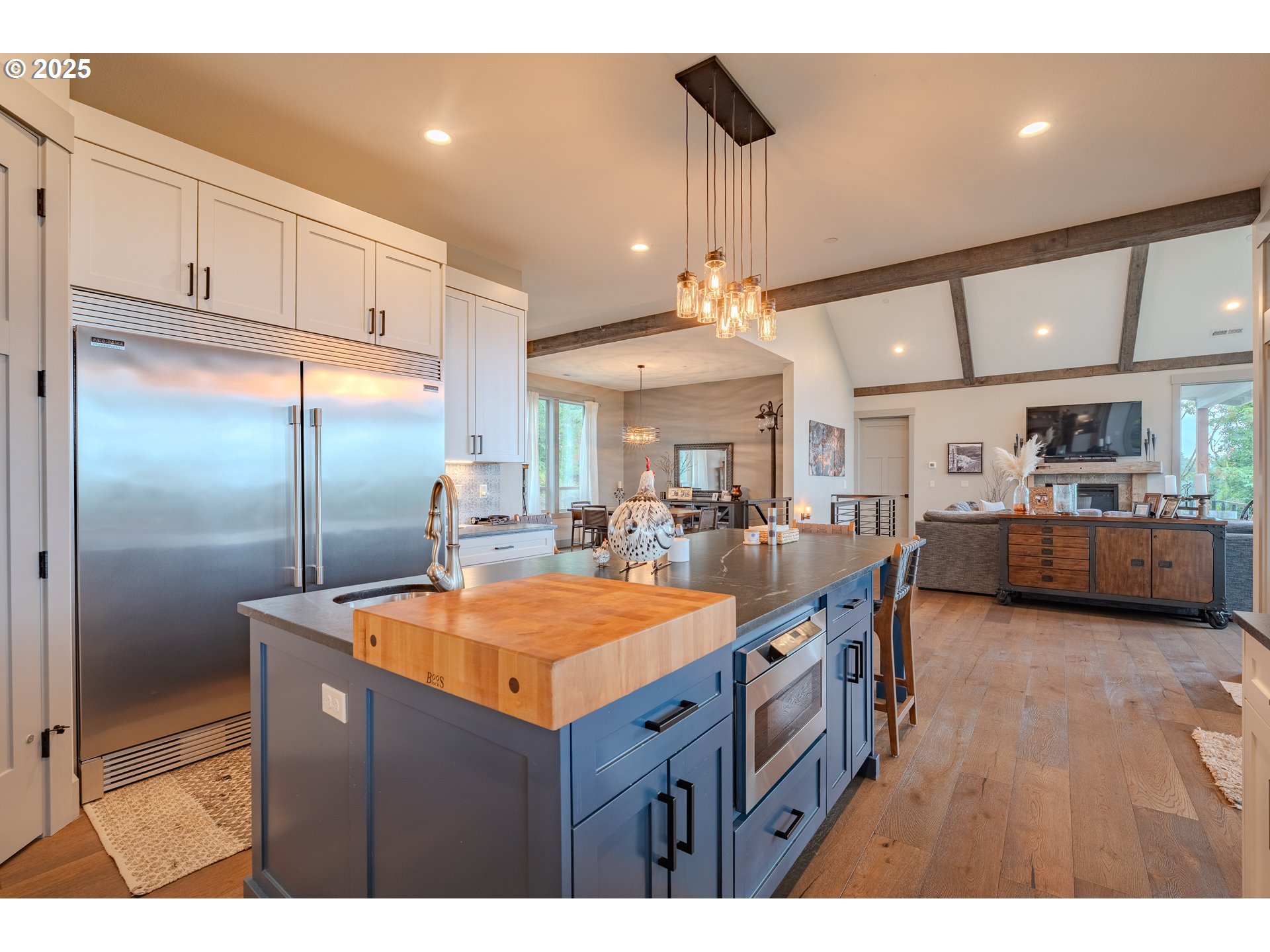 2012 Northwest Sierra Lane Camas, WA 98607 - Photo 8 of 42 a kitchen with stainless steel appliances granite countertop a sink a stove and a refrigerator