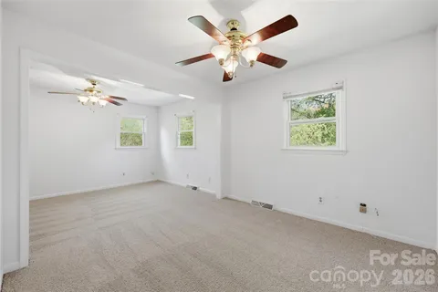 en view of an empty room with a window