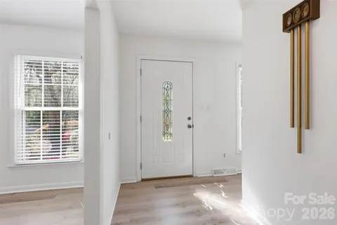 a view of empty room with windows