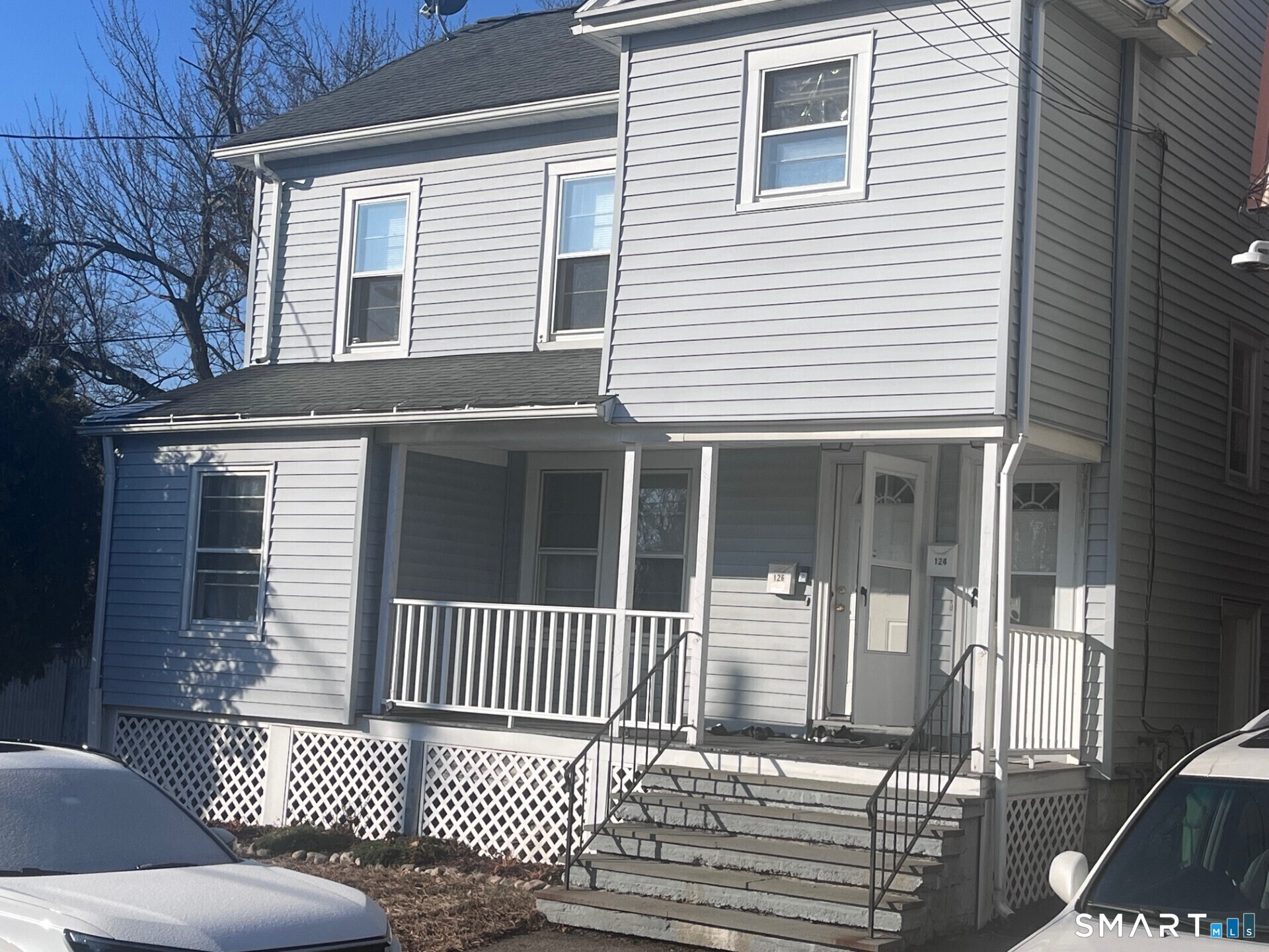 124 Thorpe Street Fairfield, CT 06824 - Photo 1 of 23 a front view of a house
