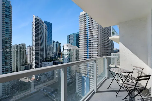 a view of balcony with furniture