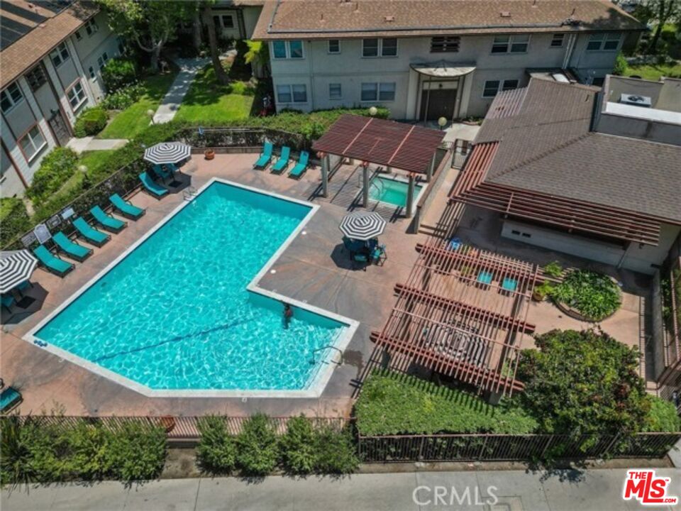 5832 Bowcroft Street, Unit 4 Los Angeles, CA 90016 - Photo 20 of 34 an aerial view of a house with garden space and street view