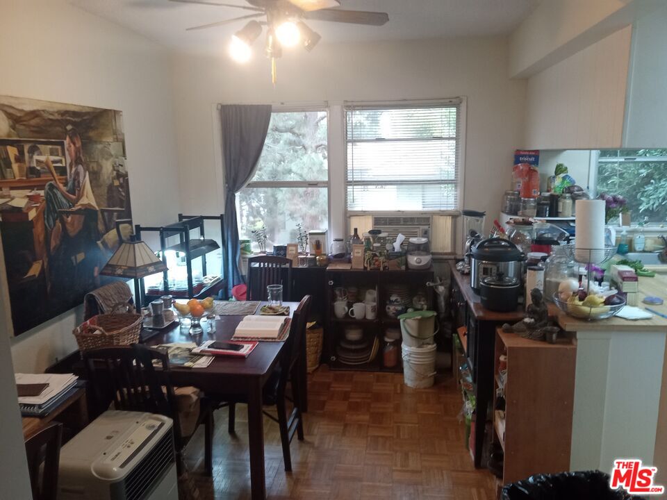 5832 Bowcroft Street, Unit 4 Los Angeles, CA 90016 - Photo 5 of 34 a view of a dining room with furniture and window