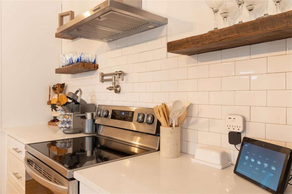 2173 Anderson Avenue Northeast Covington, GA 30014 - Photo 17 of 49 a kitchen with a sink and cabinets