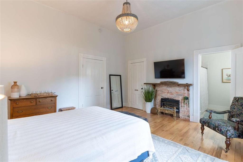 2173 Anderson Avenue Northeast Covington, GA 30014 - Photo 22 of 49 a bedroom with a bed and a television