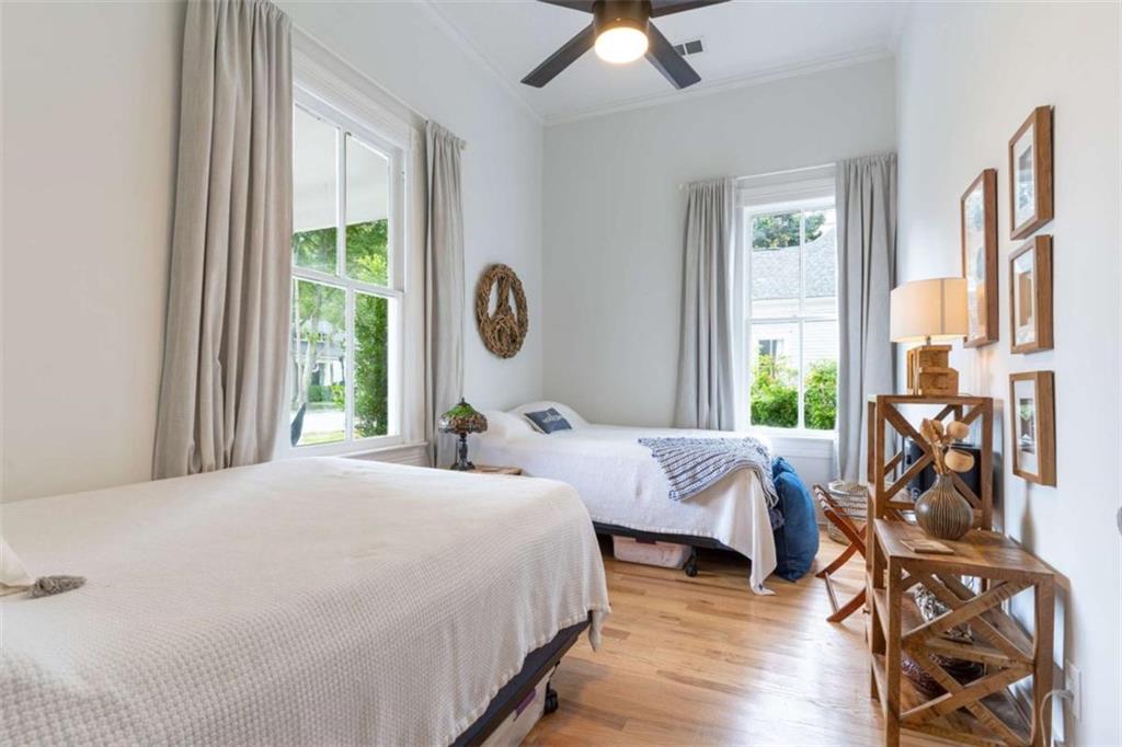 2173 Anderson Avenue Northeast Covington, GA 30014 - Photo 25 of 49 a bedroom with two beds and a large window