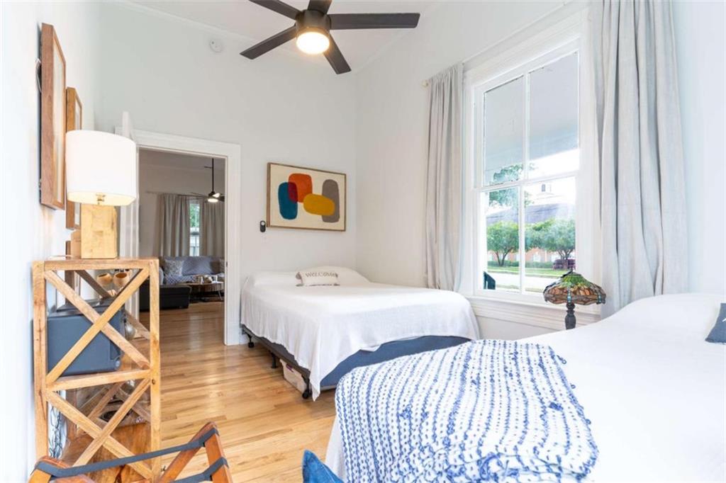 2173 Anderson Avenue Northeast Covington, GA 30014 - Photo 26 of 49 a bedroom with a bed and a chandelier