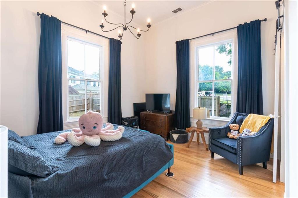 2173 Anderson Avenue Northeast Covington, GA 30014 - Photo 32 of 49 a living room with furniture and a window