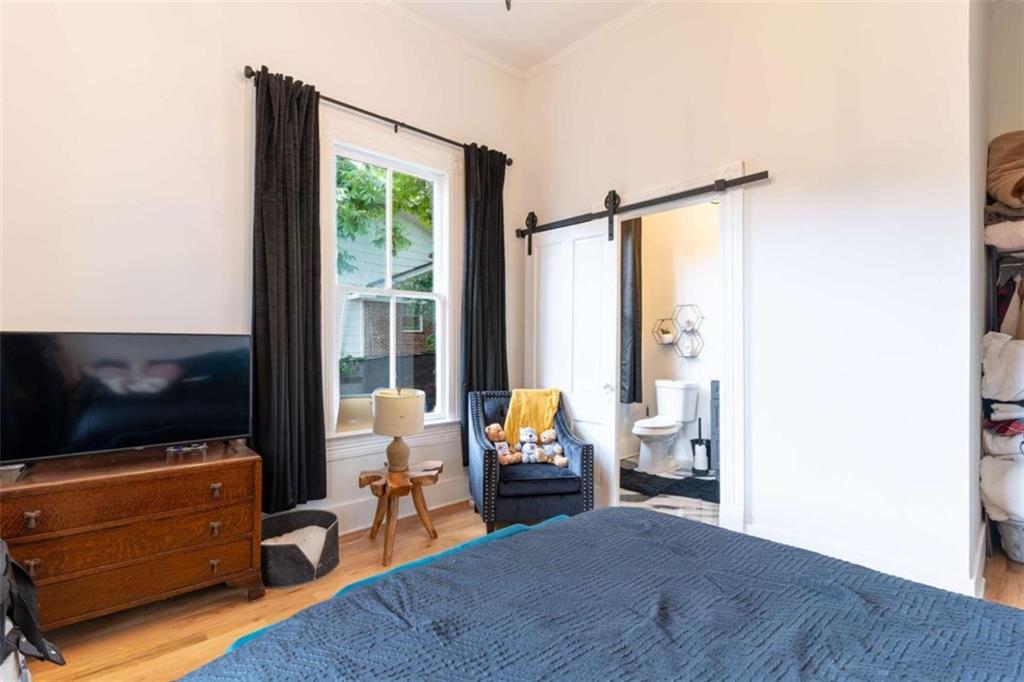2173 Anderson Avenue Northeast Covington, GA 30014 - Photo 33 of 49 a living room with furniture and a flat screen tv