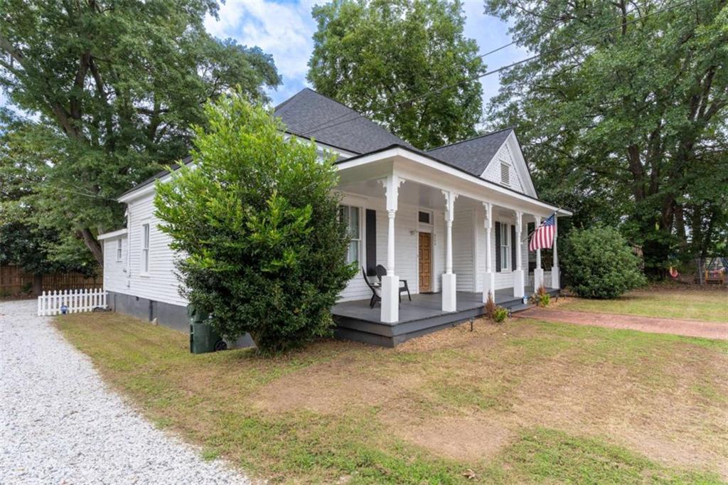 2173 Anderson Avenue Northeast Covington, GA 30014 - Photo 40 of 49 a front view of a house with a yard