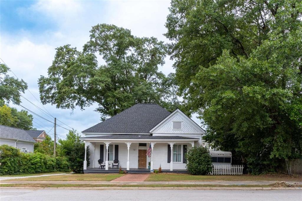 2173 Anderson Avenue Northeast Covington, GA 30014 - Photo 49 of 49 a front view of a house with garden