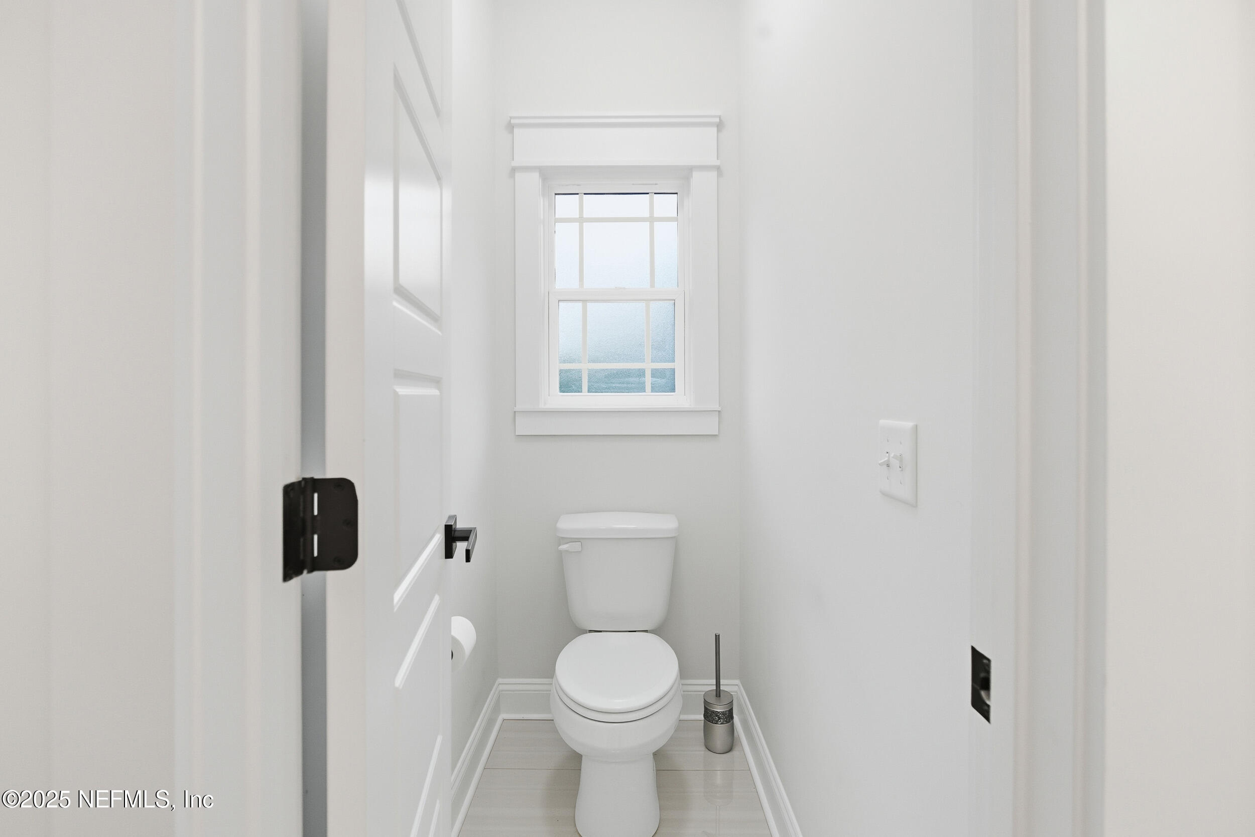 128 Santa Rosa Street Florahome, FL 32140 - Photo 30 of 57 a white toilet sitting next to a bathroom sink