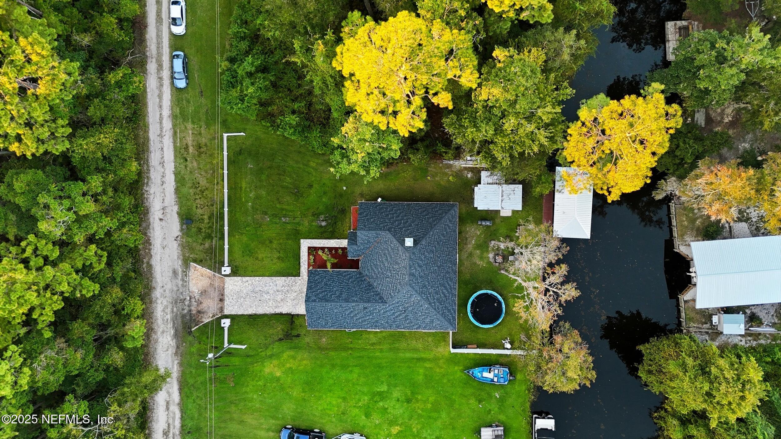 128 Santa Rosa Street Florahome, FL 32140 - Photo 40 of 57 an aerial view of a house