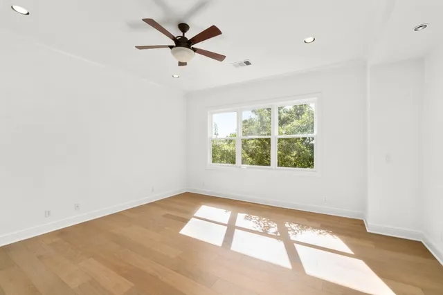 a kitchen with stainless steel appliances a refrigerator and cabinets